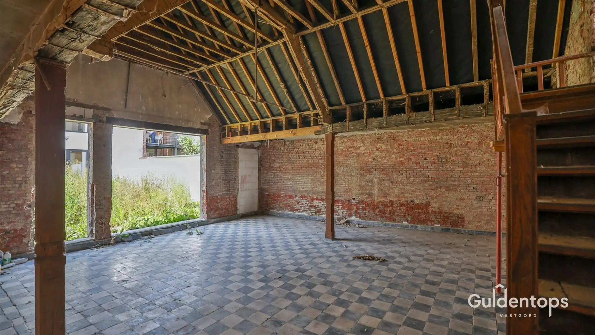 Knap gelijkvloers appartement in hartje Lier met grote tuin foto 17