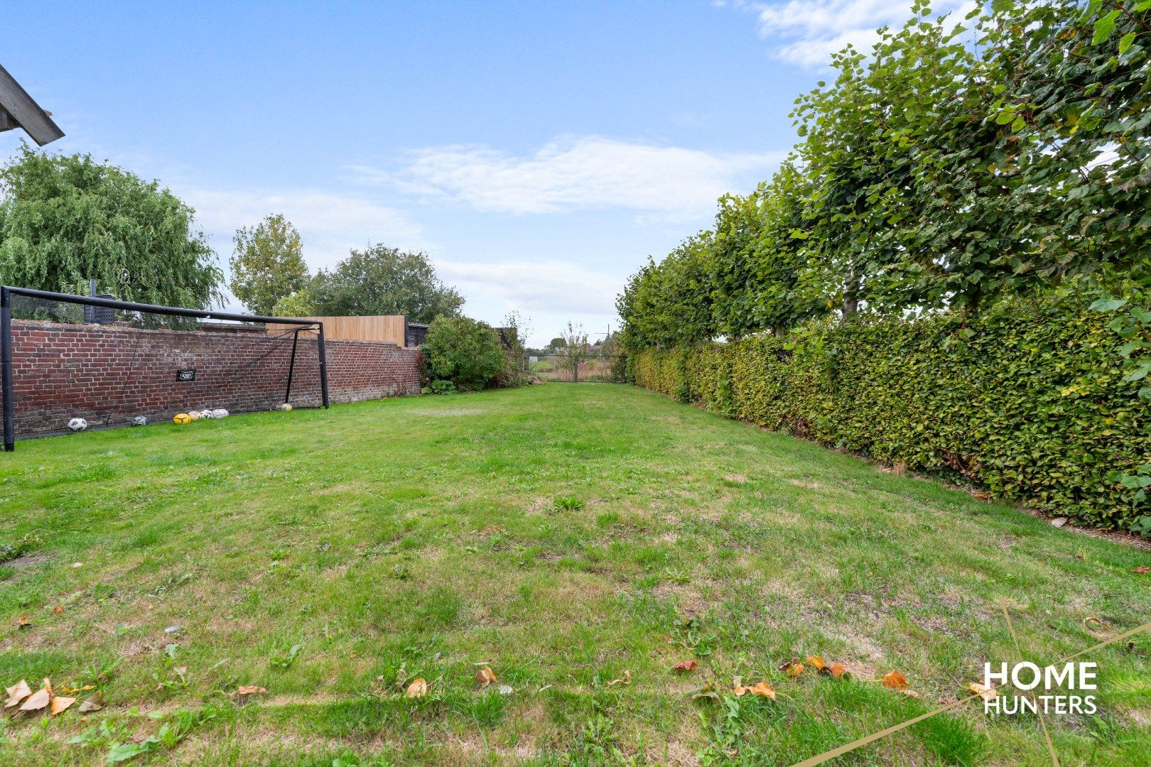 Ruime woning met 4 slaapkamers, een ruime zonnige tuin met verwarmd zwembad foto 10