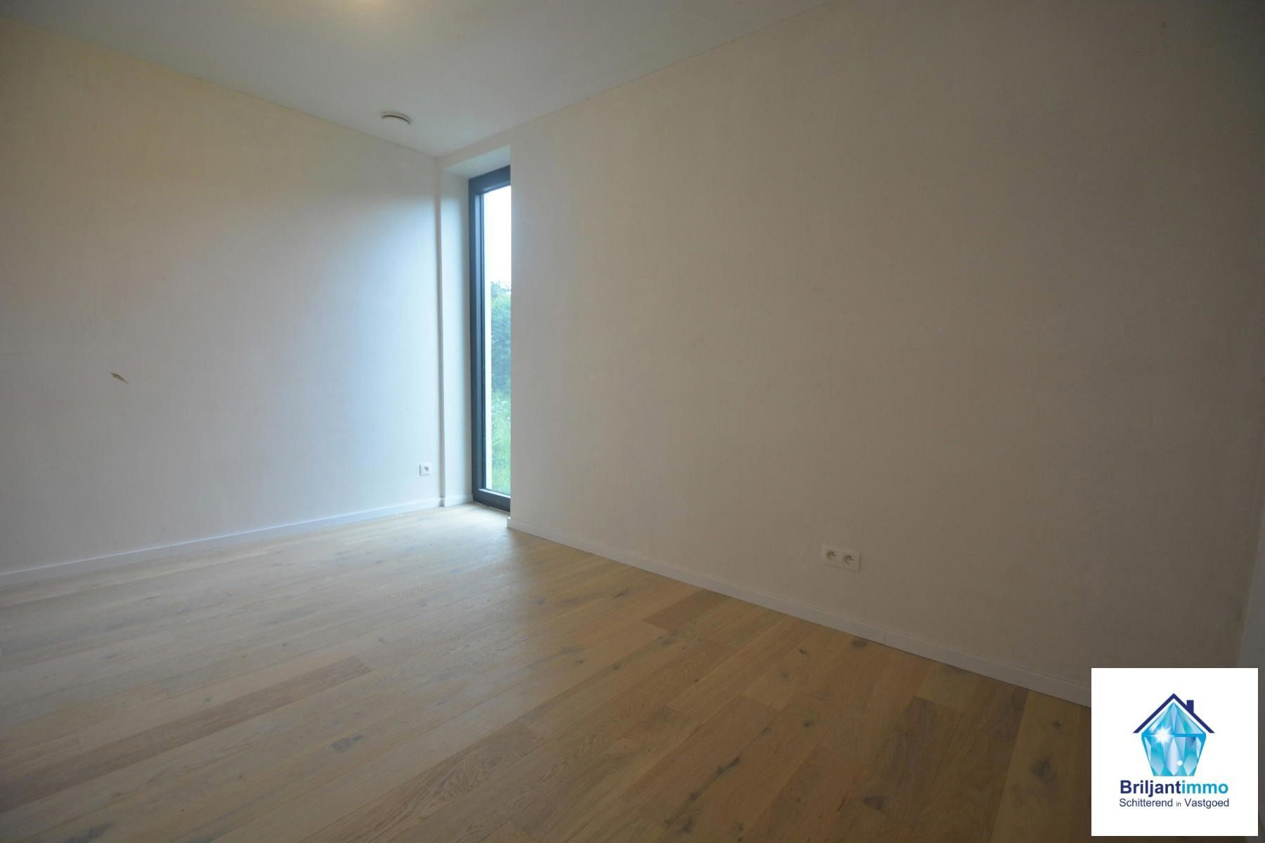 Modern energiezuinig gelijkvloers 1 slaapkamer app foto 11