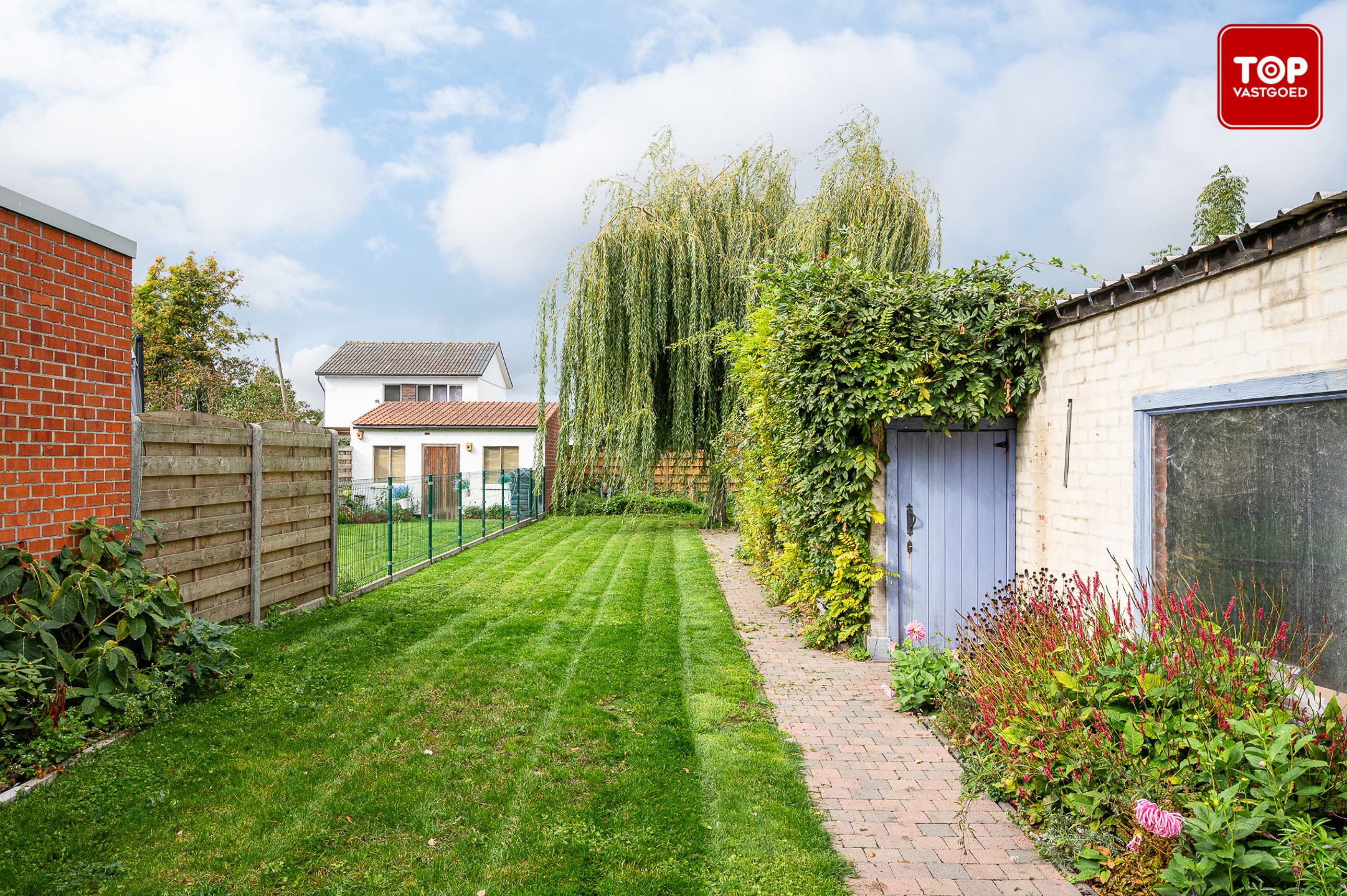 Halfopen woning met 4 slaapkamers, grote tuin en  ruime garage foto 18