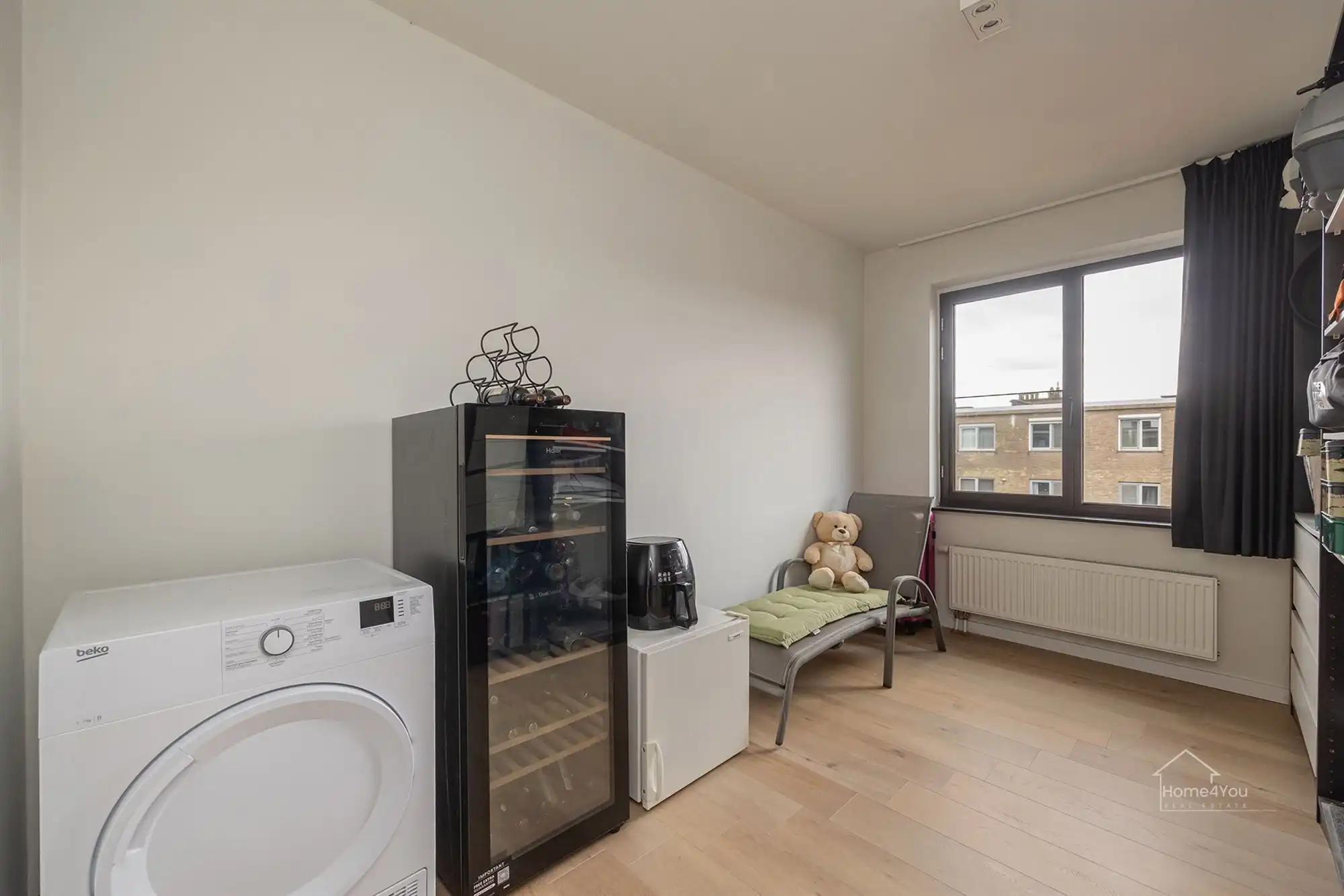 Ruim en lichtrijk appartement met terras + autostaanplaats foto 17