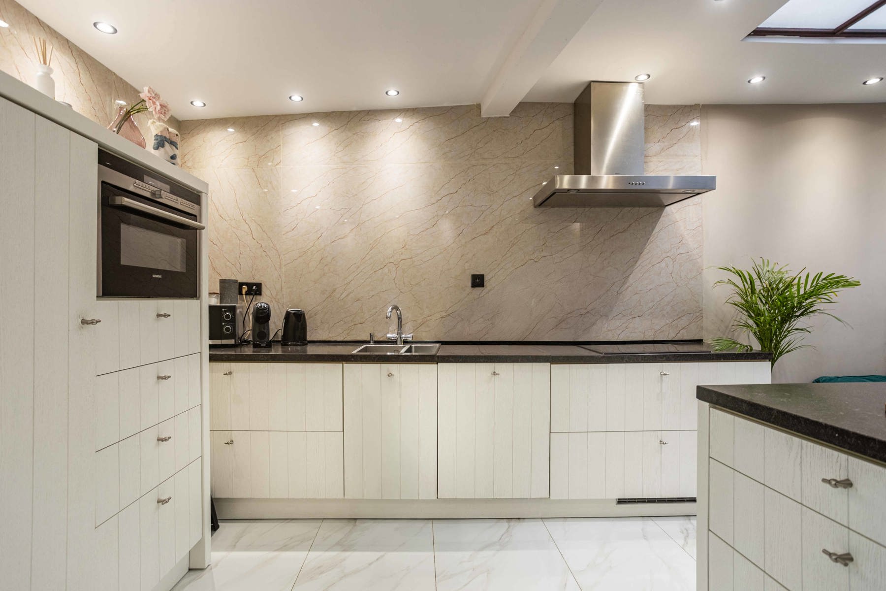 Gerenoveerde stadswoning met tuin en 3 SLP foto 7