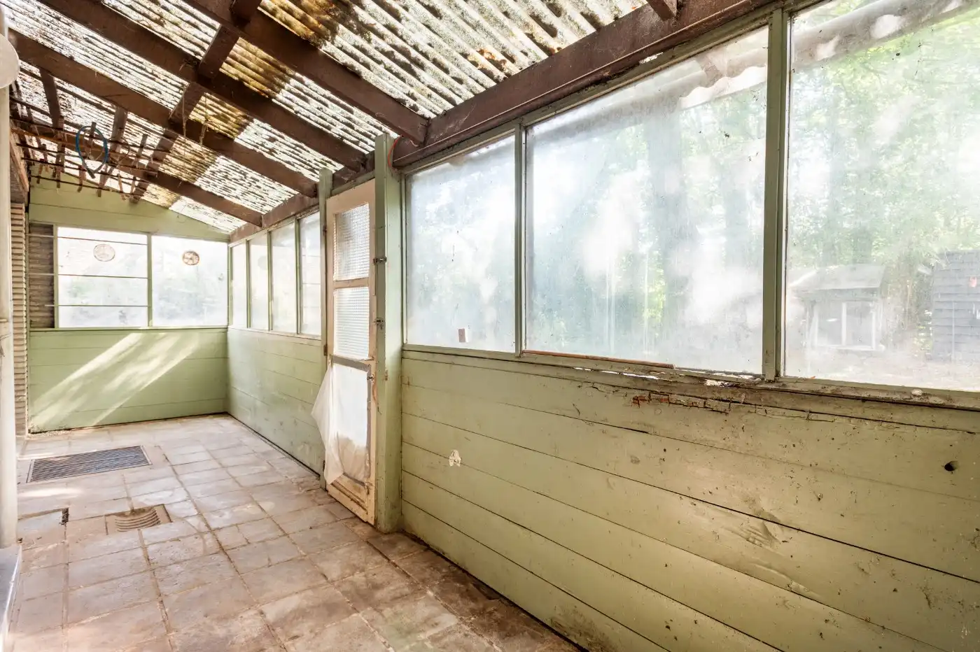 Te renoveren woning met 3 slpk., garage en tuin foto 10