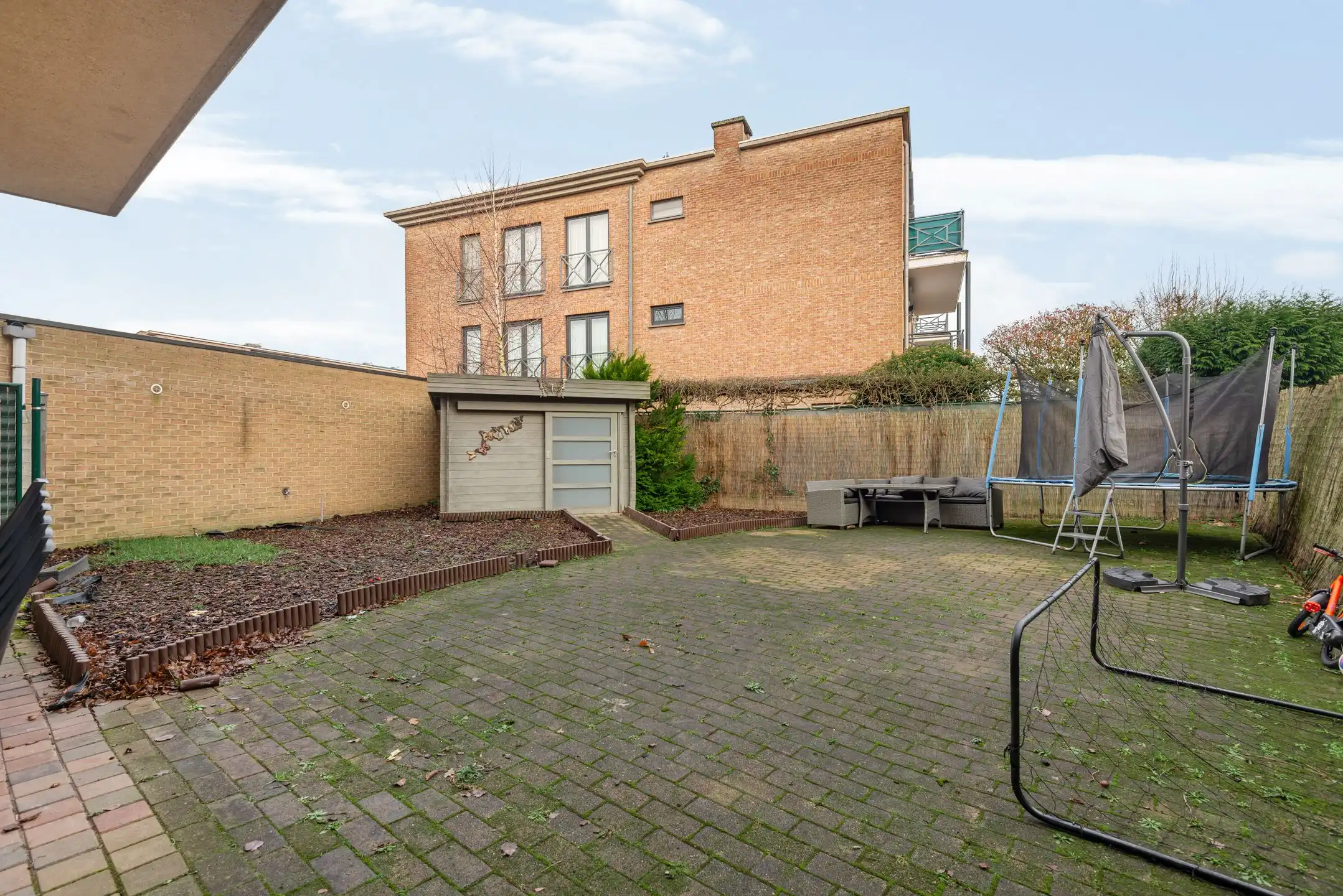 Opbrengsteigendom met 3 appartementen + garageboxen in Wommelgem te koop! foto 13