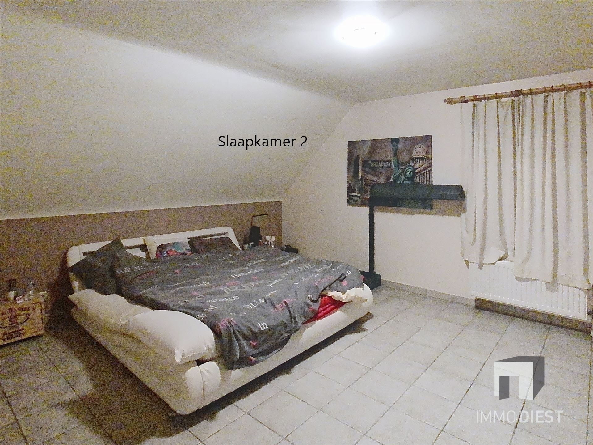 Triplex met 2 slaapkamers en inpandige garage foto 10
