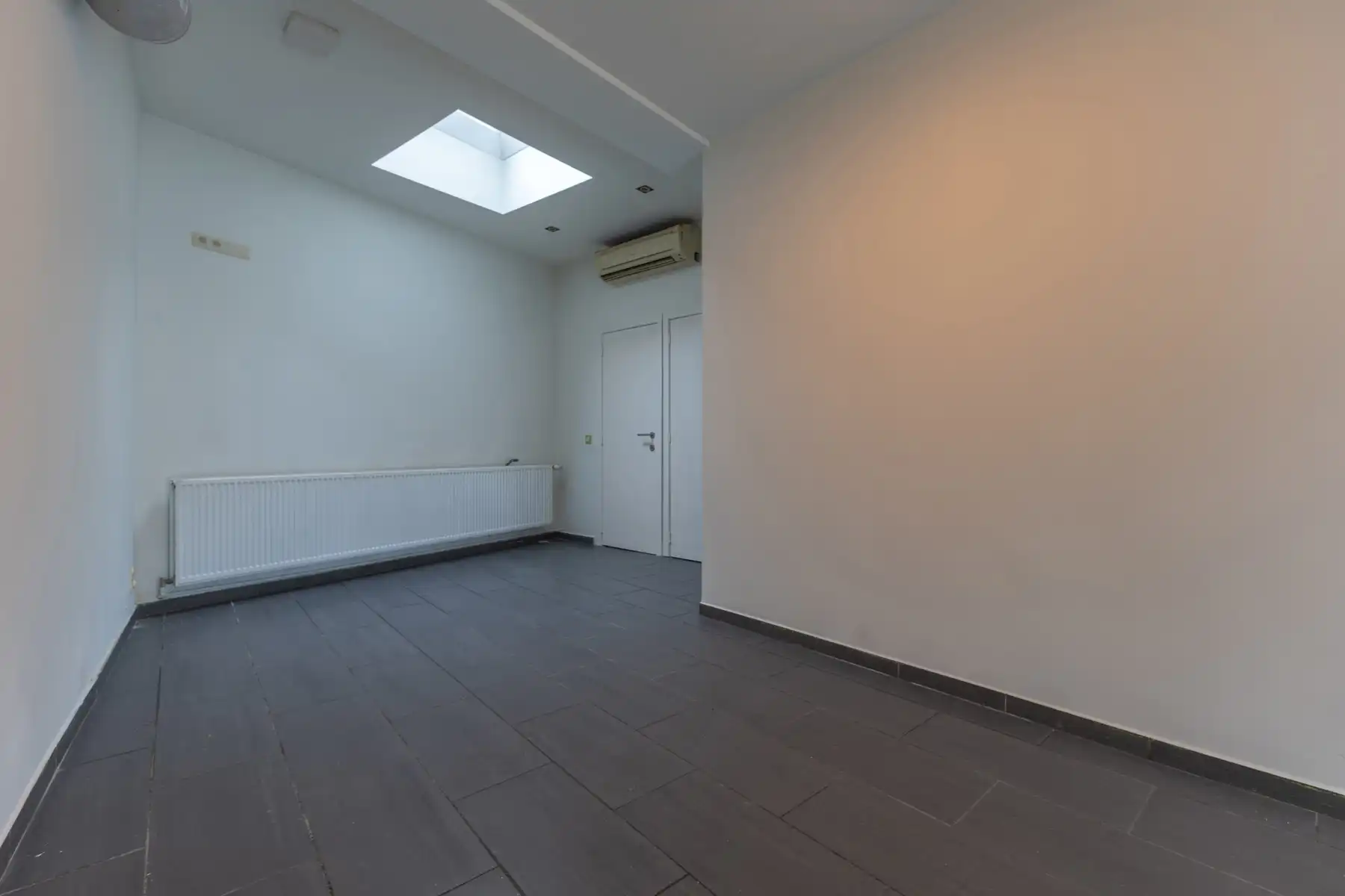 Commercieel gelijkvloers met duplex in centrum Halle foto 7