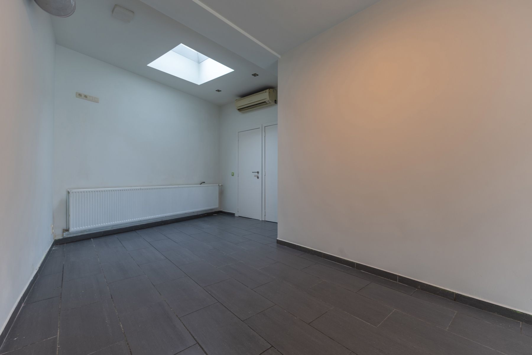 Commercieel gelijkvloers met duplex in centrum Halle foto 7