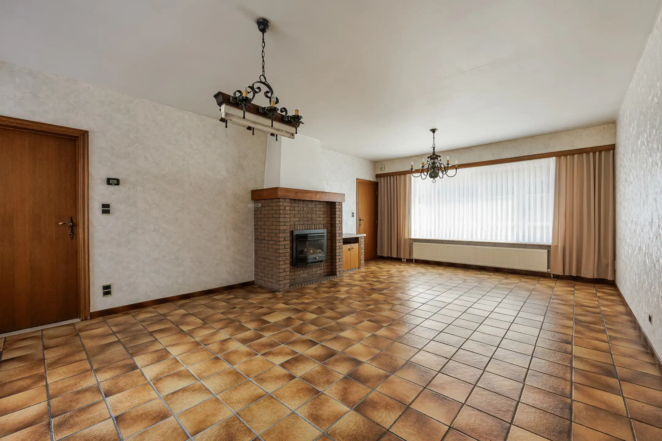 Te renoveren 3slpk-woning met 2 garages & tuin nabij centrum foto 5