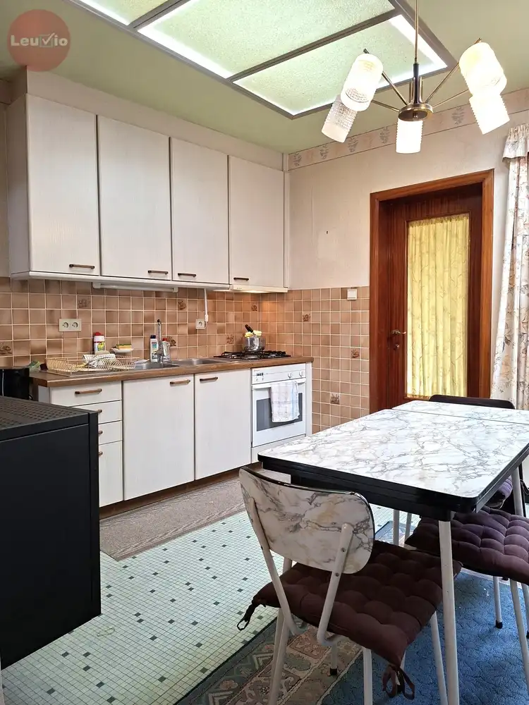 Goed gelegen woning // 2 slaapkamers + zolder om af te werken foto 7