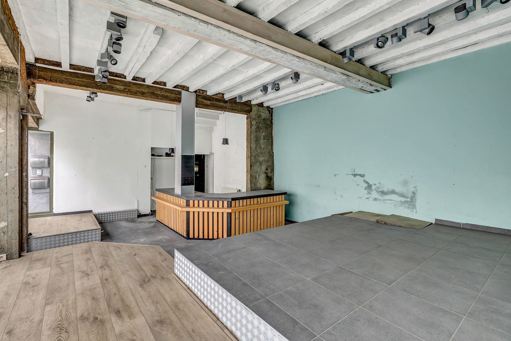 Opbrengsteigendom: Handelsruimte met 3 slpk app in centrum foto 9