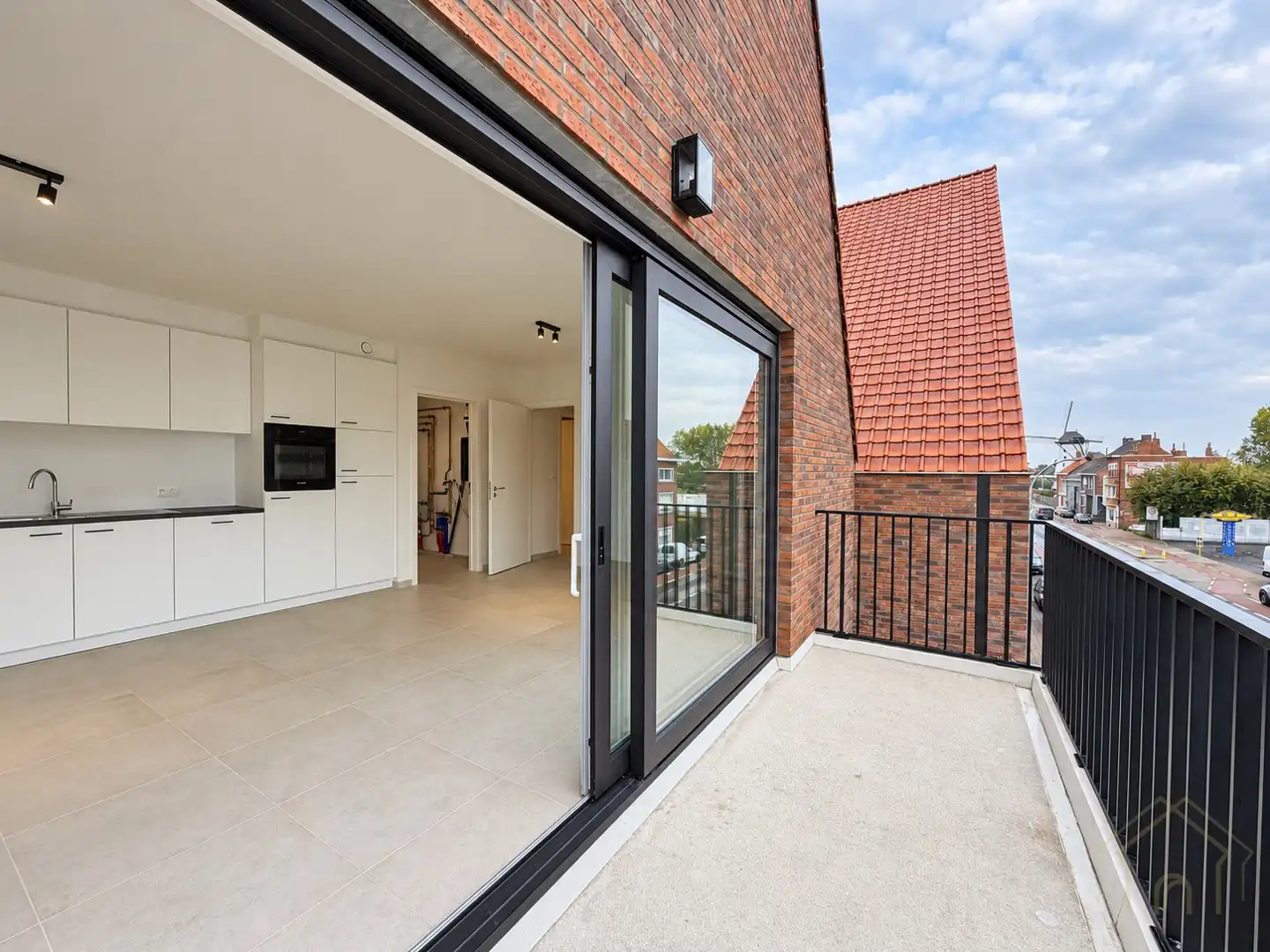 Lichtrijk éénslaapkamerappartement met garage foto 3
