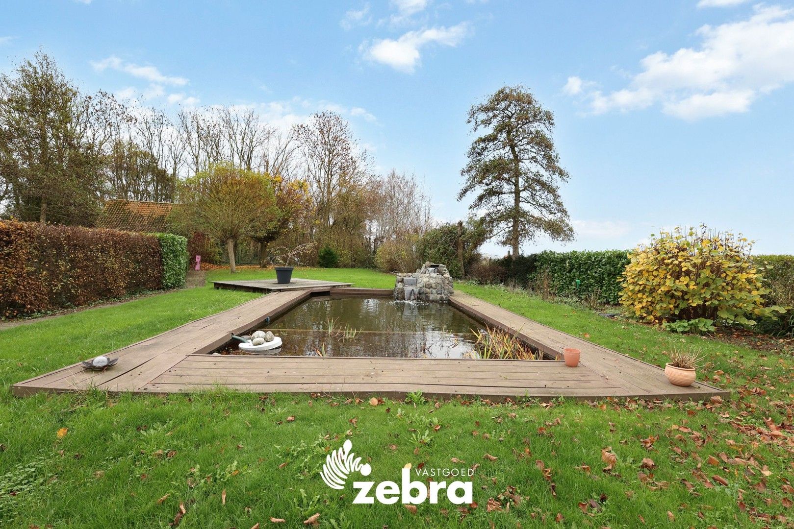 Ruime woning met grote tuin, zwemvijver en schuur in Beveren aan de IJzer! foto 24