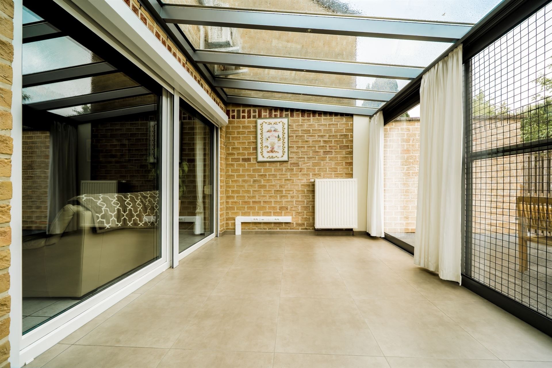 Rustig gelegen gezinswoning met 3 slpks en tuin. foto 3