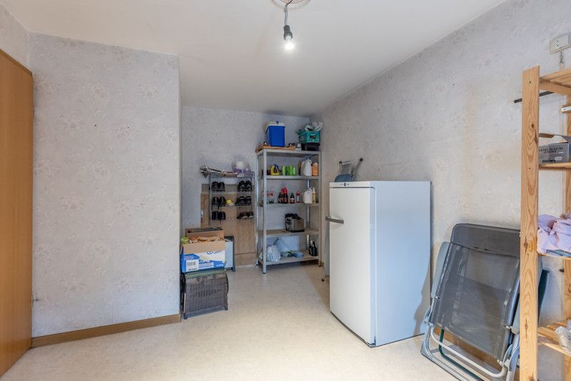 Gelijkvloers appartement met 2 slpkms, autostaanplaats en private berging foto 29