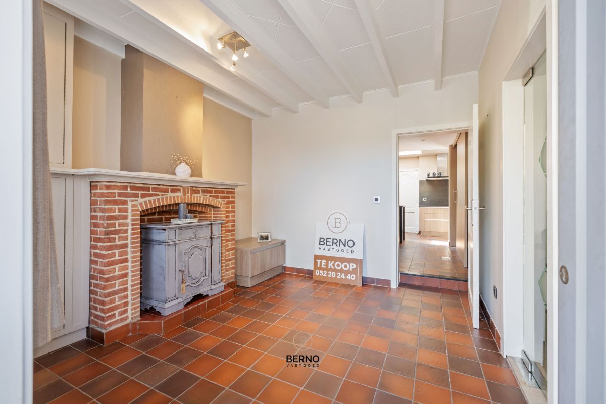 Instapklare rijwoning met 3 slaapkamers, ruime garage en zongerichte tuin. foto 3