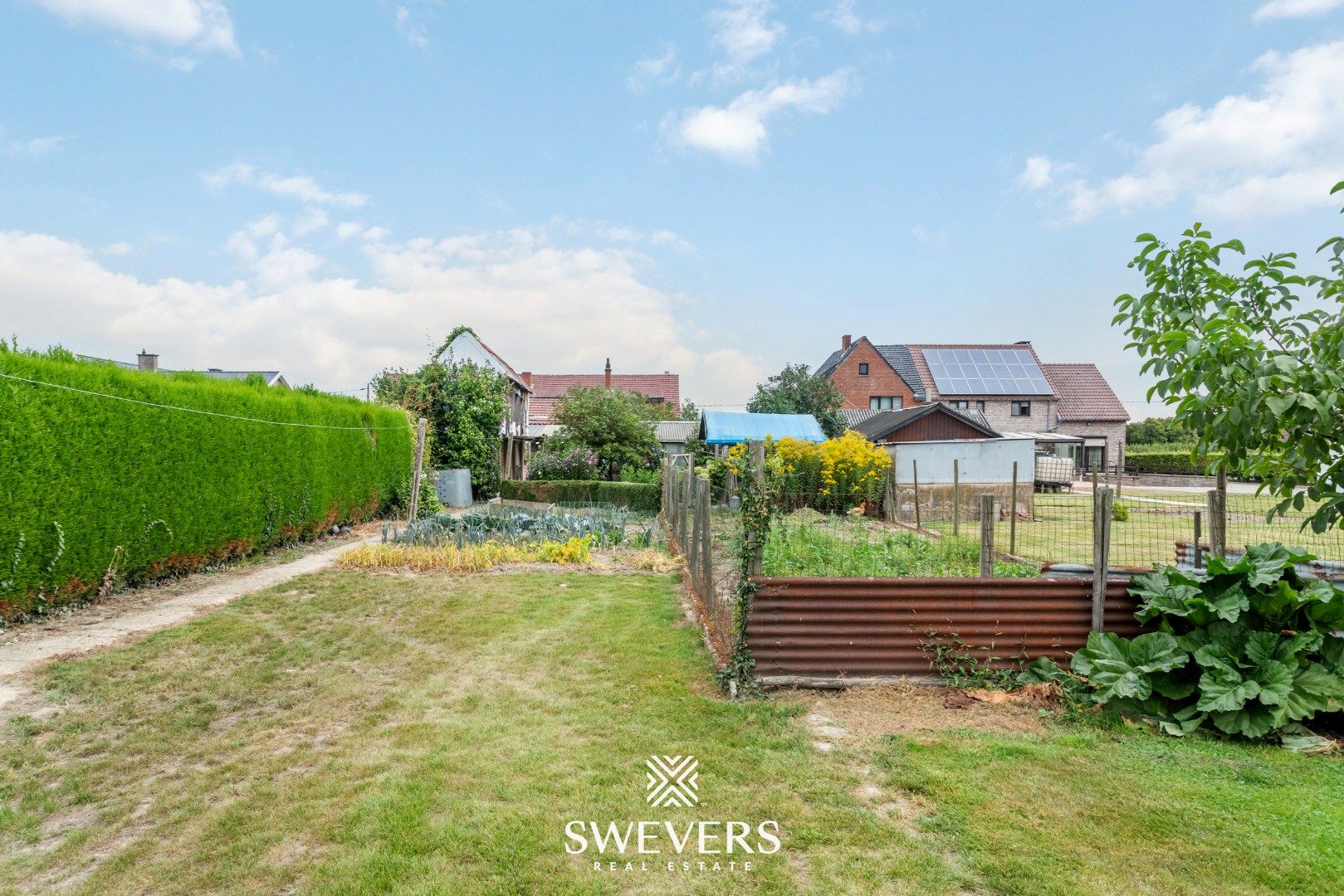 Te renoveren woning met grote tuin in hartje Wellen foto 27