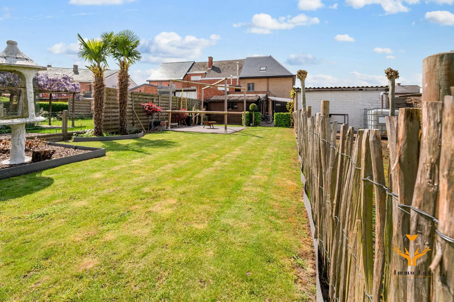 Halfopen bebouwing met tuin en garage in centrum Kalken foto 2