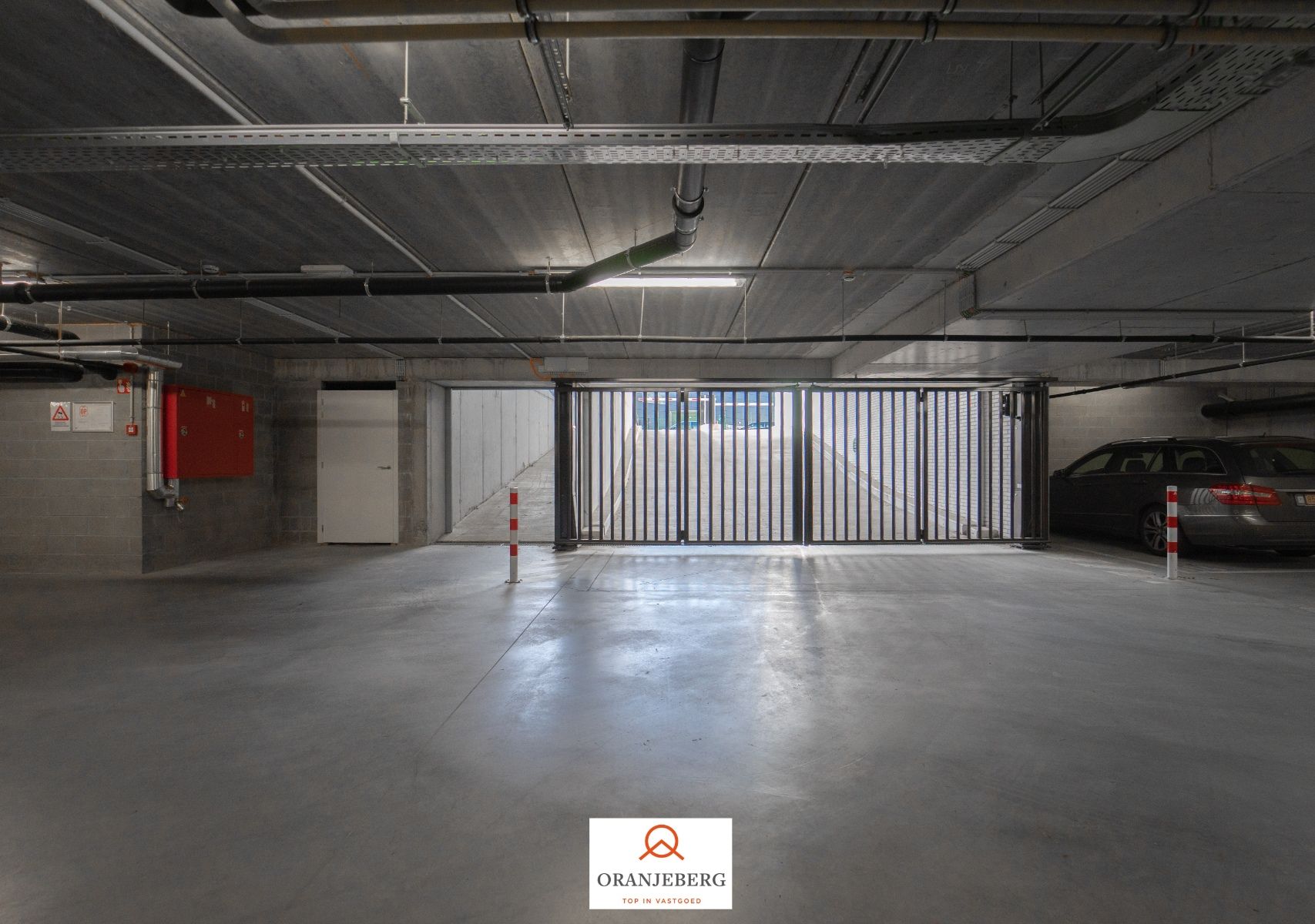 Nieuwbouw autostaanplaats te huur in afgesloten parkeergarage nabij Gent centrum foto 8
