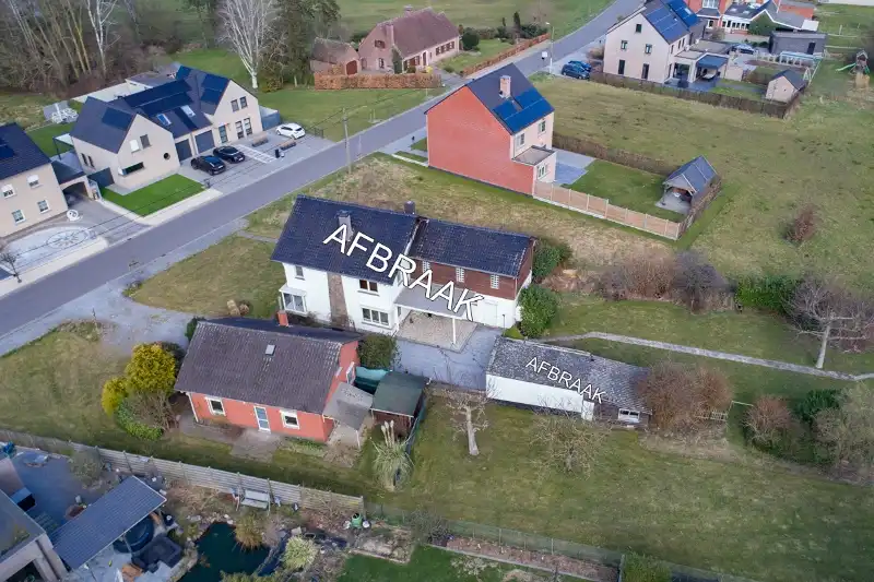 Te renoveren (uitbreidbare) woning (6% btw) of sloop/heropbouw op een rustig gelegen perceel van +- 11are op wandelafstand van het centrum van Diepenbeek! foto 3