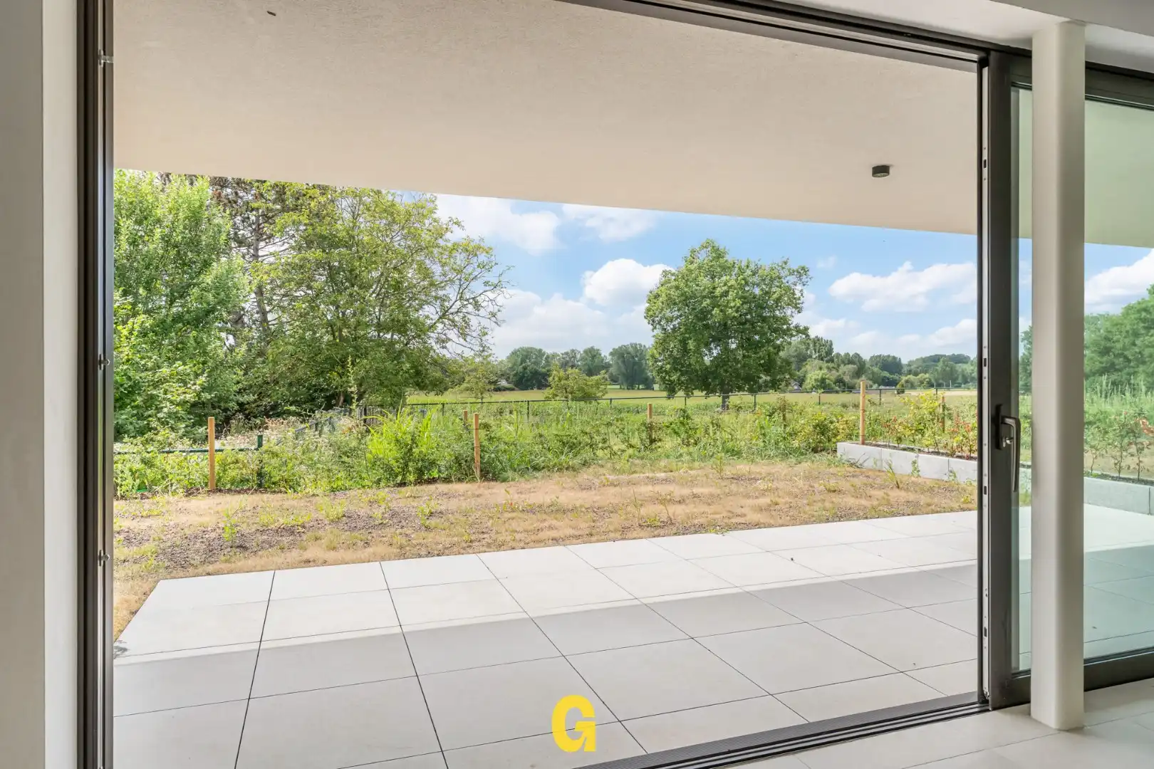 Gelijkvloers nieuwbouwappartement in residentie Bella Vista met 1 slaapkamer en terras en tuin met blijvend zicht op achterliggend groen, vlakbij het centrum.  foto 3