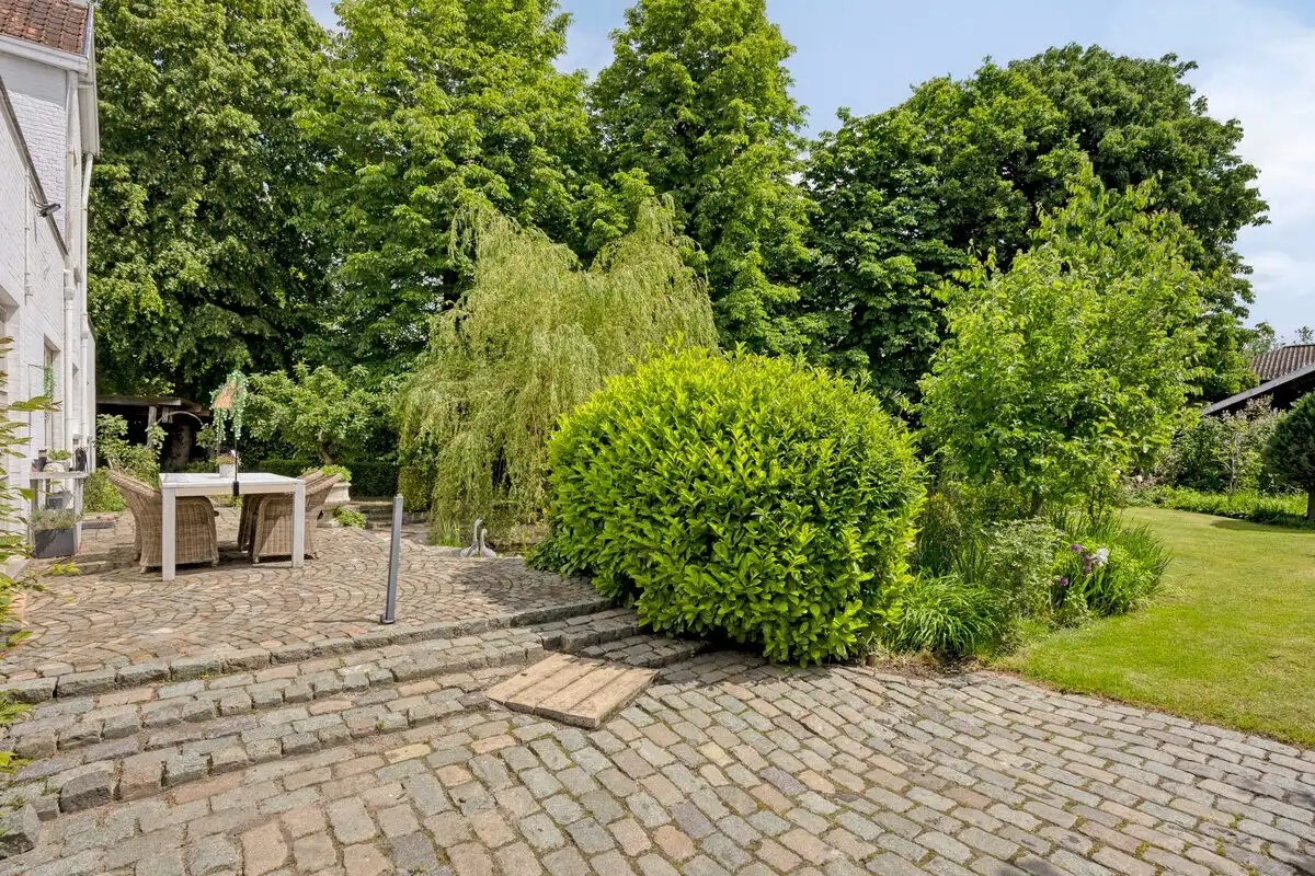 Bijzonder historisch herenhuis te koop in Heppen foto 48