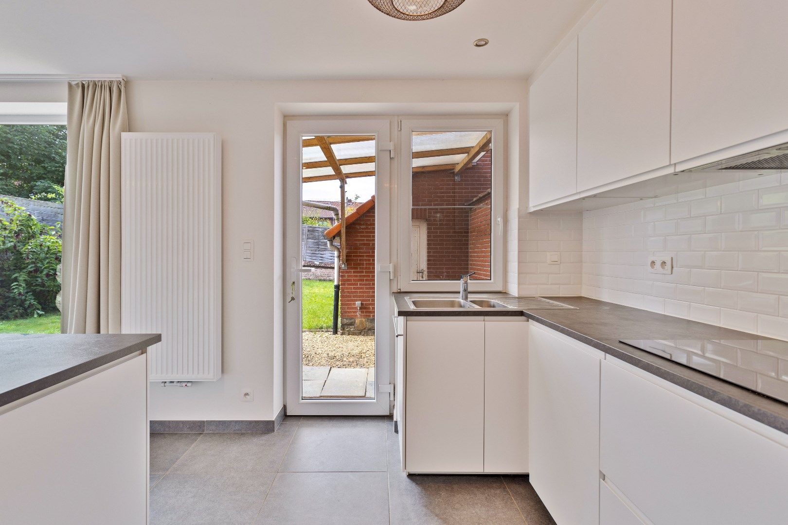 Te huur LEMBEEK: Gerenoveerde woning 2 slpk, bureau en tuin foto 14