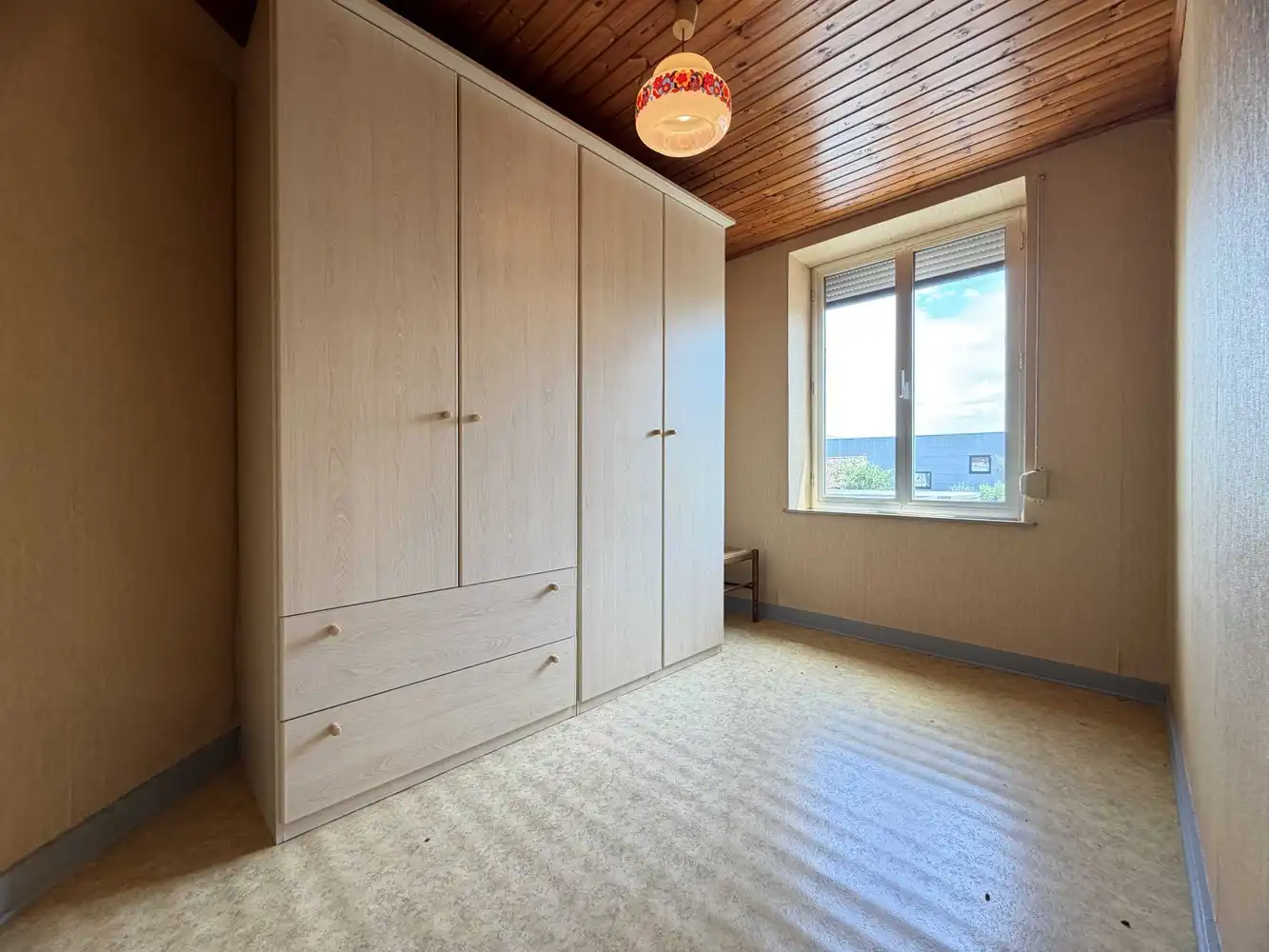 Rustig gelegen wijkwoning met zongerichte tuin foto 15