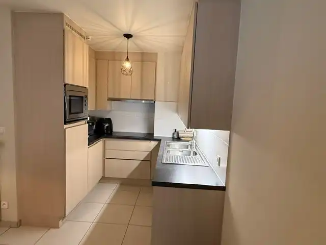 Ruim en toegankelijk 2-slaapkamerappartement met terras in Waregem foto 11