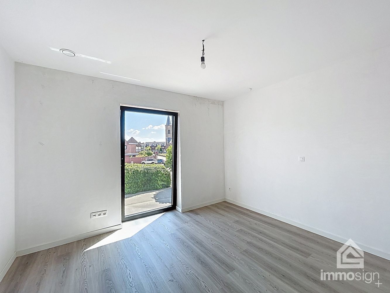 Instapklaar nieuwbouwappartement met 2 slaapkamers, terras en autostaanplaats te Kinrooi foto 9