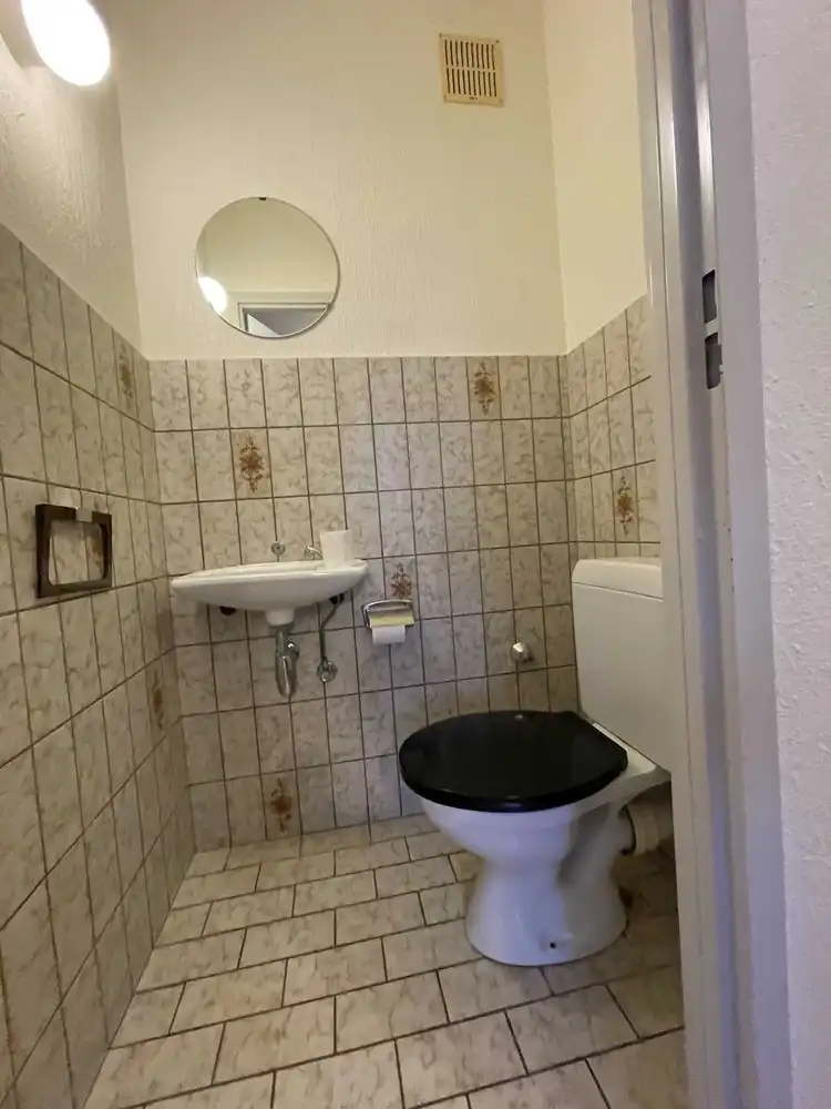 Goed gelegen drieslaapkamerappartement met garage foto 8
