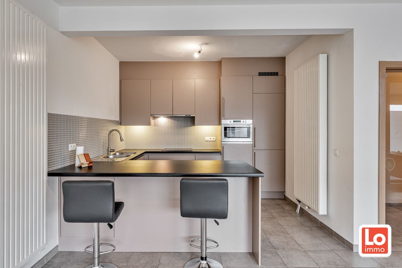 Ruim instap klaar appartement met ondergrondse autostaanplaats op een toplocatie vlakbij het centrum van Lokeren! foto 9
