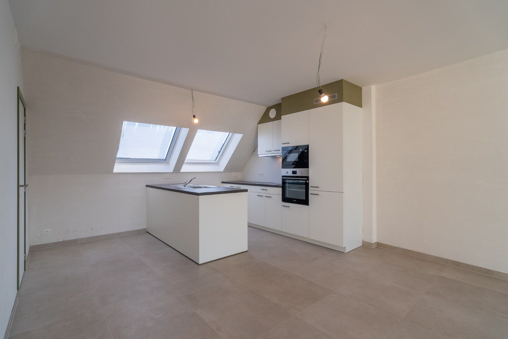 Gezellig nieuw dakappartement met 1 slaapkamer en terras op de tweede verdieping, in Residentie Escautval. foto 4