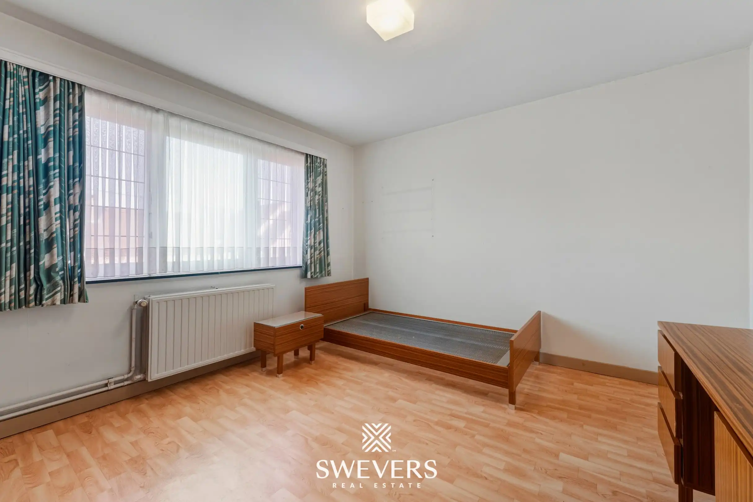 Vrijstaande woning met drie slaapkamers, bureauruimte en tuin in Houthalen foto 17