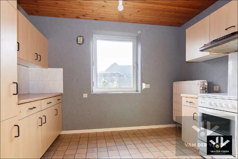 Te renoveren (uitbreidbare) woning (6% btw) met garage op een rustig gelegen perceel van +- 11are op wandelafstand van het centrum van Diepenbeek! foto 9
