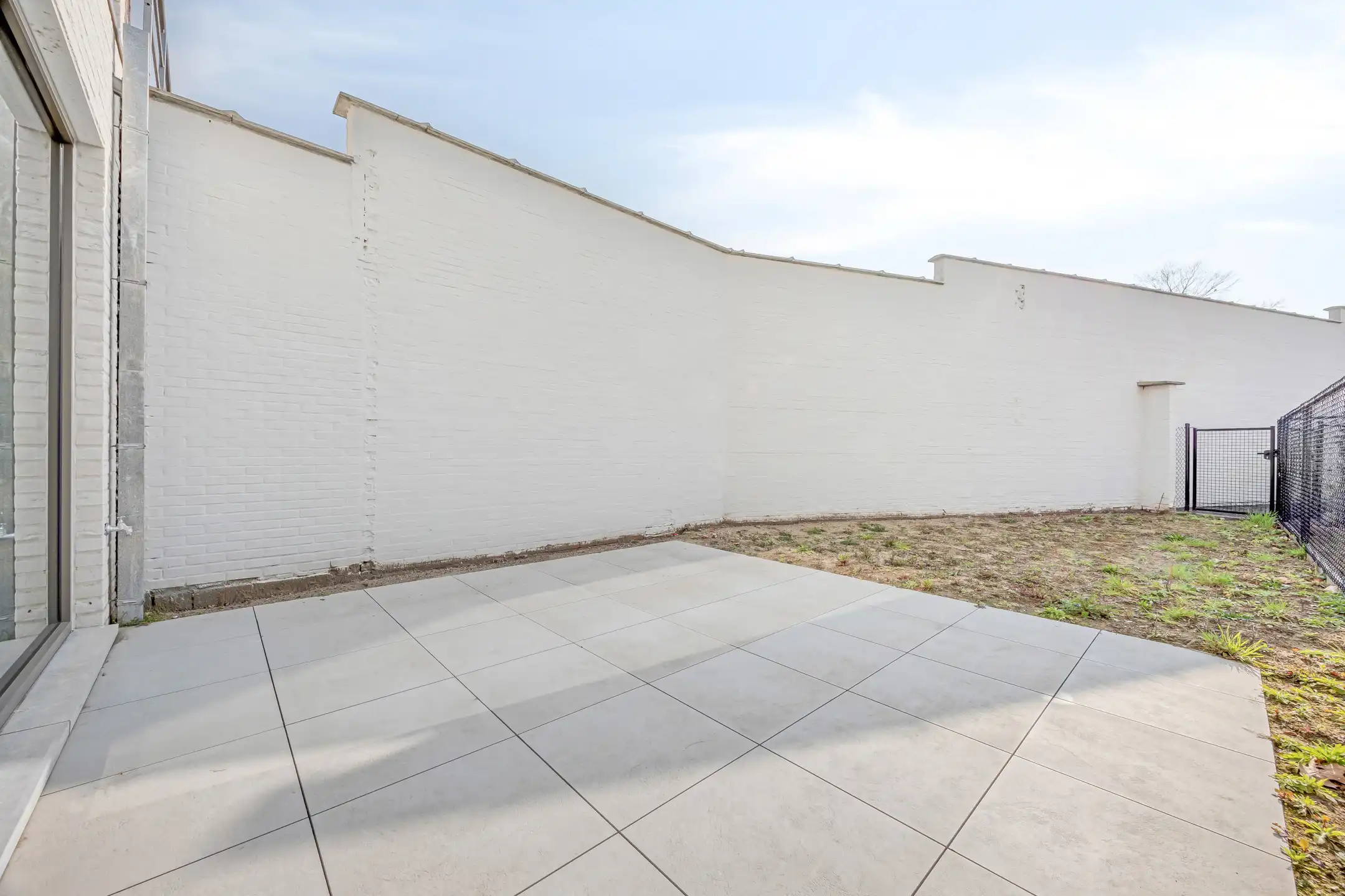 Stijlvol gelijkvloers appartement met tuin foto 21