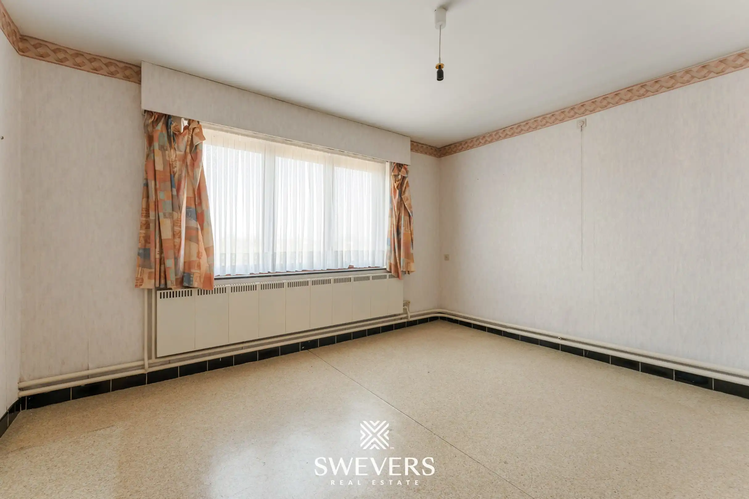 Te renoveren woning met 4 slaapkamers, grote tuin en omliggende velden op rustige ligging nabij centrum Diepenbeek foto 17