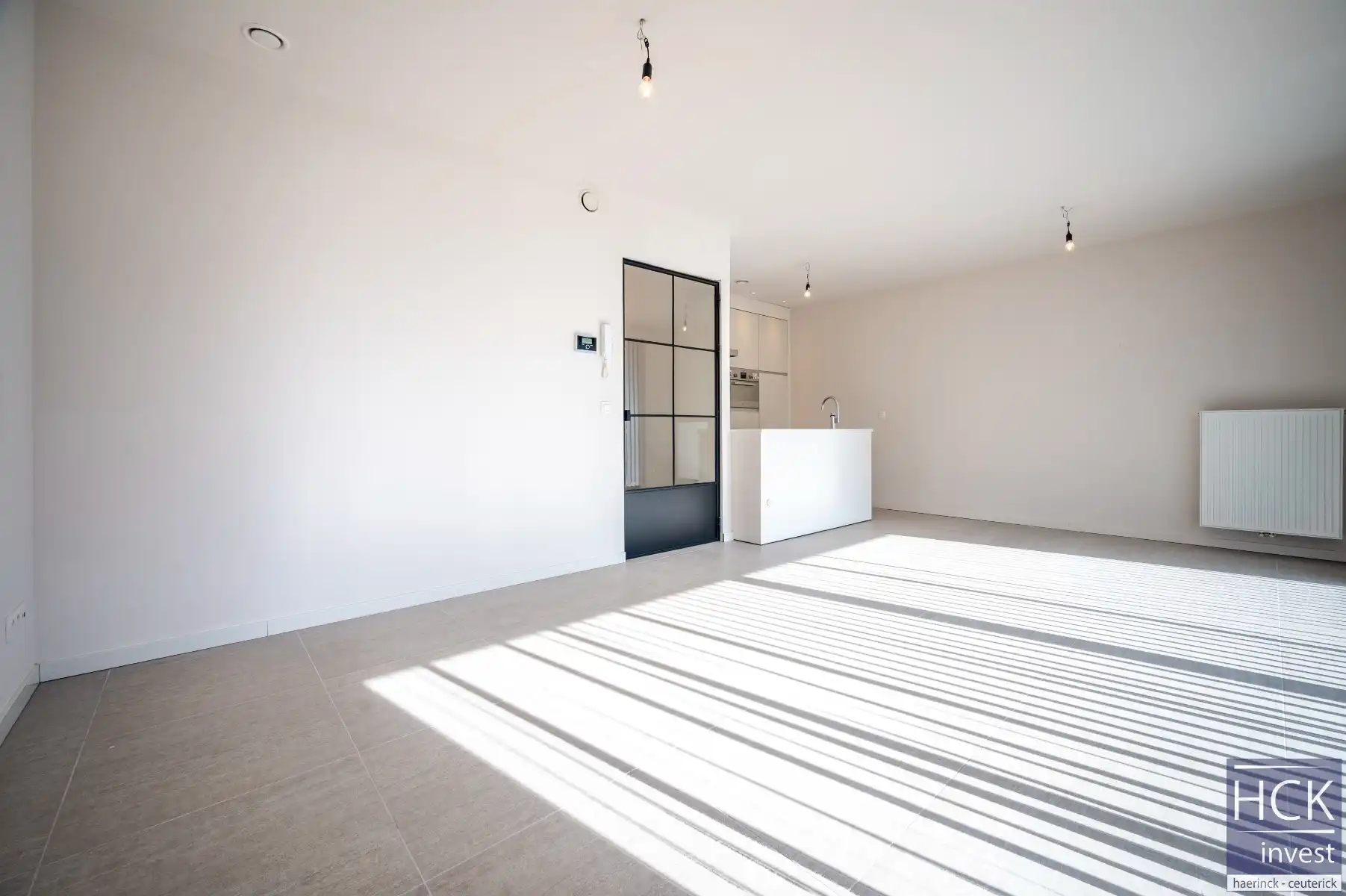 KRUISHOUTEM - Lichtrijk & ruim gelijkvloersapp. + terras op de Marolle foto 3