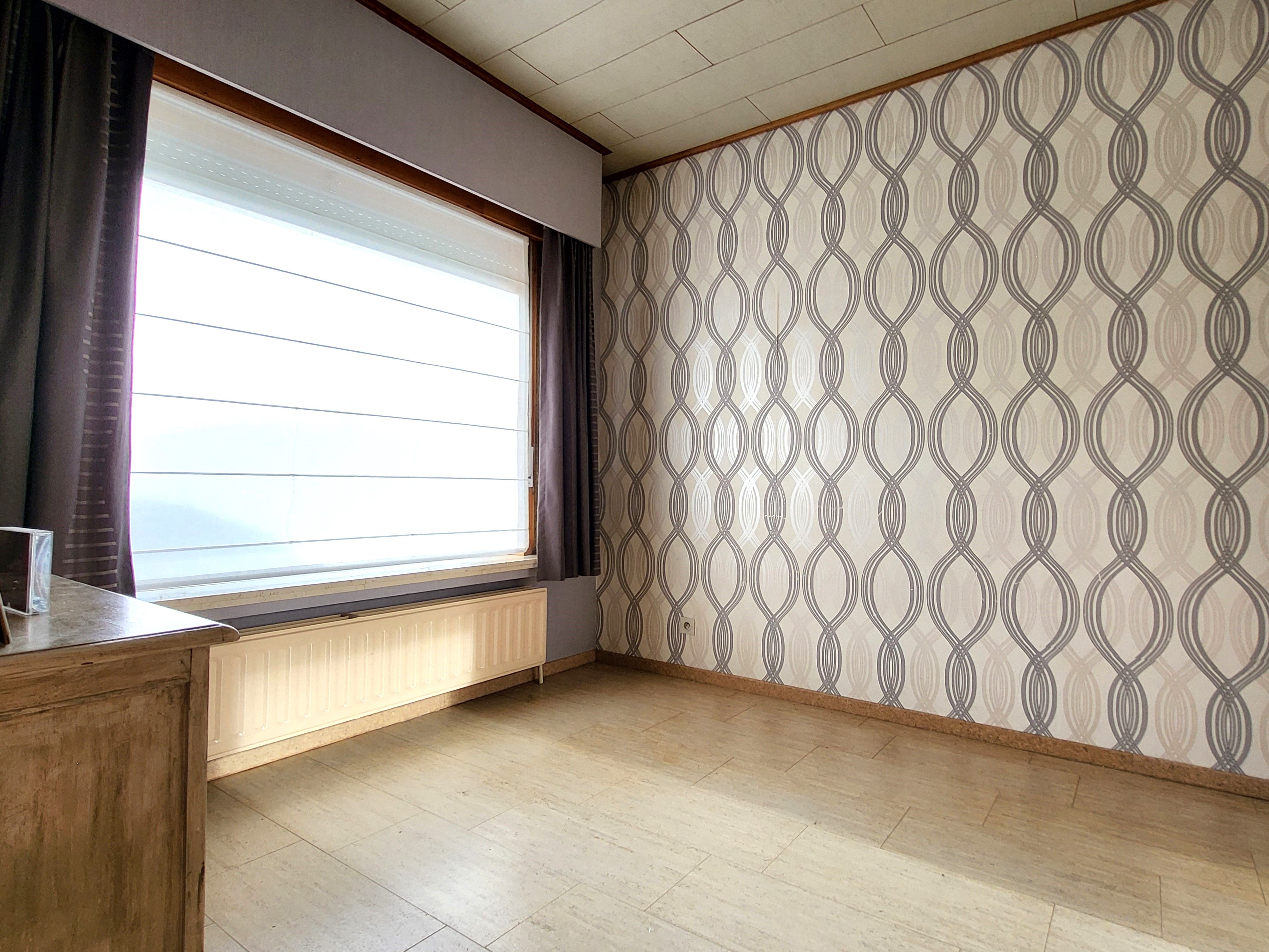 Instapklare villa op een perceel van 648 m² met dubbele garage, veranda en tuin.  foto 26