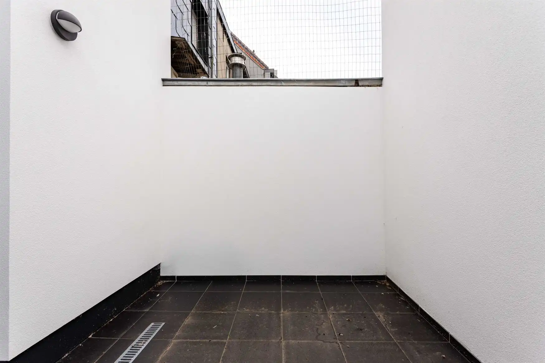 Instapklare stadswoning met terras nabij de Coupure foto 5