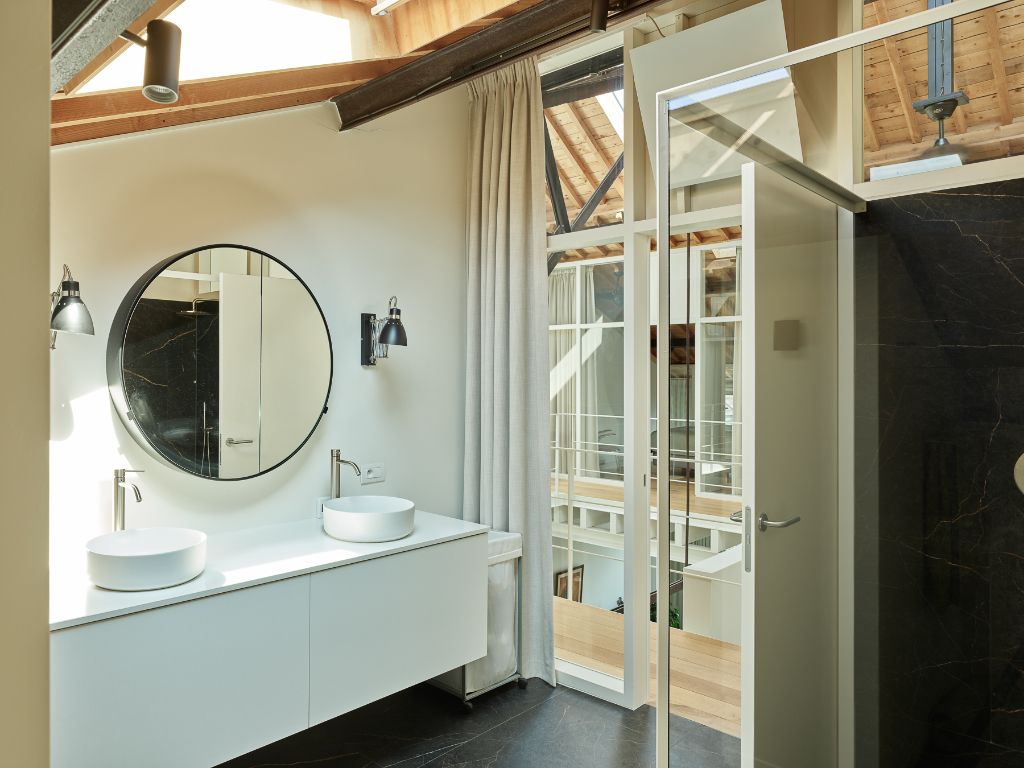 Luxueus en tijdloos – Exceptionele loft met 2 slaapkamers (mogelijkheid tot 3), ontworpen door ‘Plano Architecten’, in een beschermd gebouw met een rijkelijke industriële voorgeschiedenis. foto 17