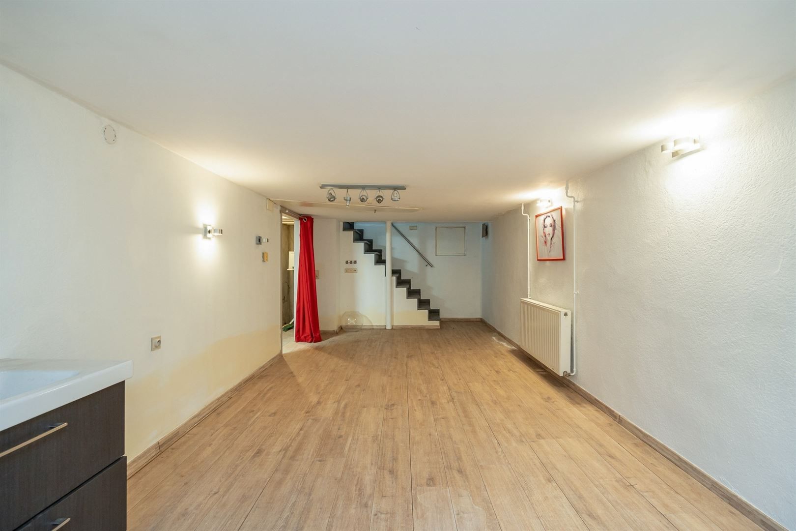 Handelshuis met ruime winkel en duplex appartement in dorp 's Gravenwezel foto 14