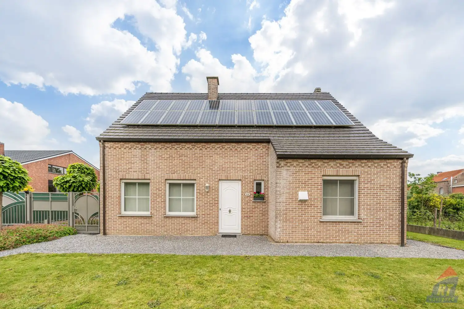 Hoofdfoto van de publicatie: Rustig gelegen open bebouwing met 4 slaapkamers, ruime tuin en dubbele garage in het groene Sint-Truiden