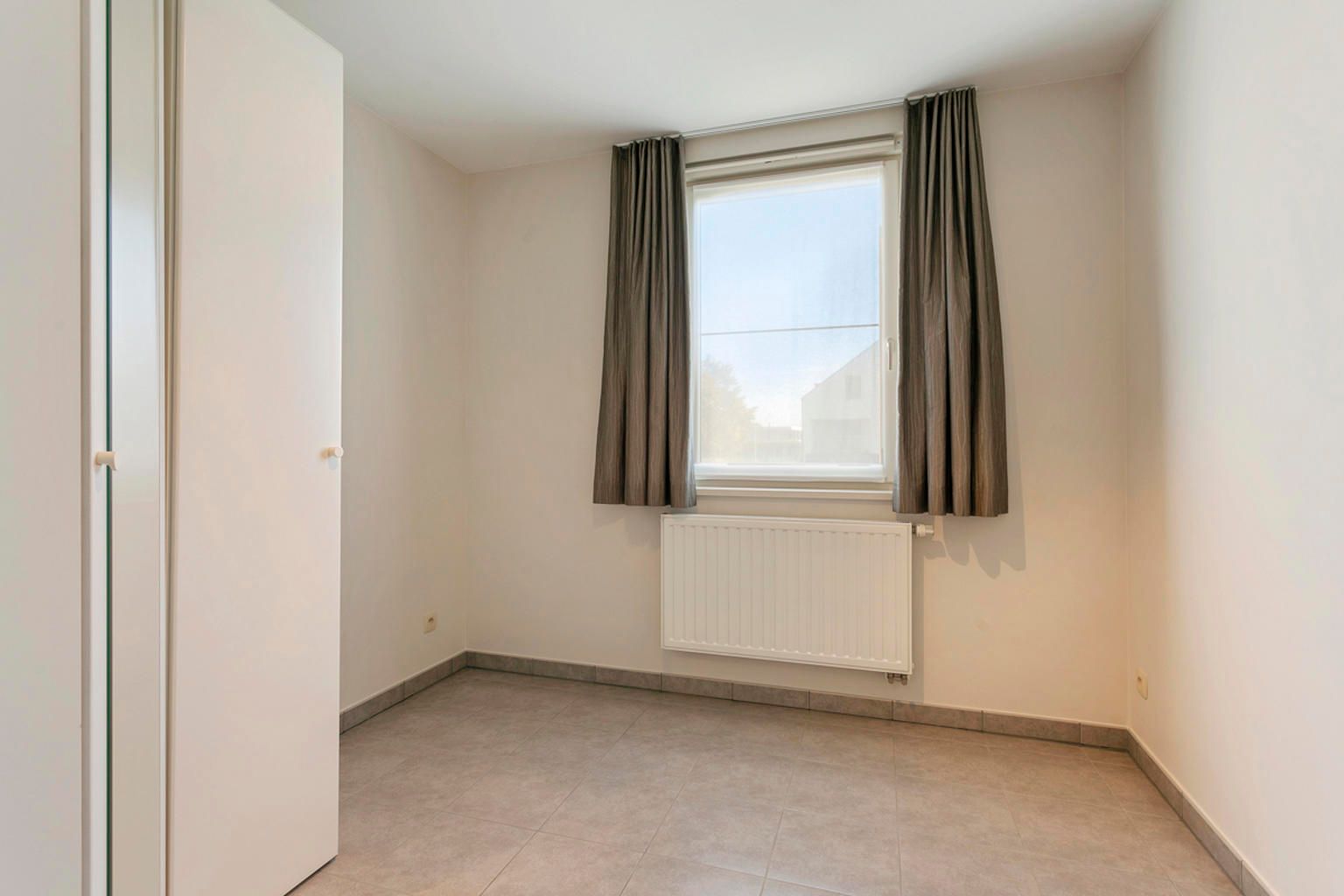 MOOI APPARTEMENT MET 2 SLAAPKAMERS EN GARAGE IN KUMTICH foto 17