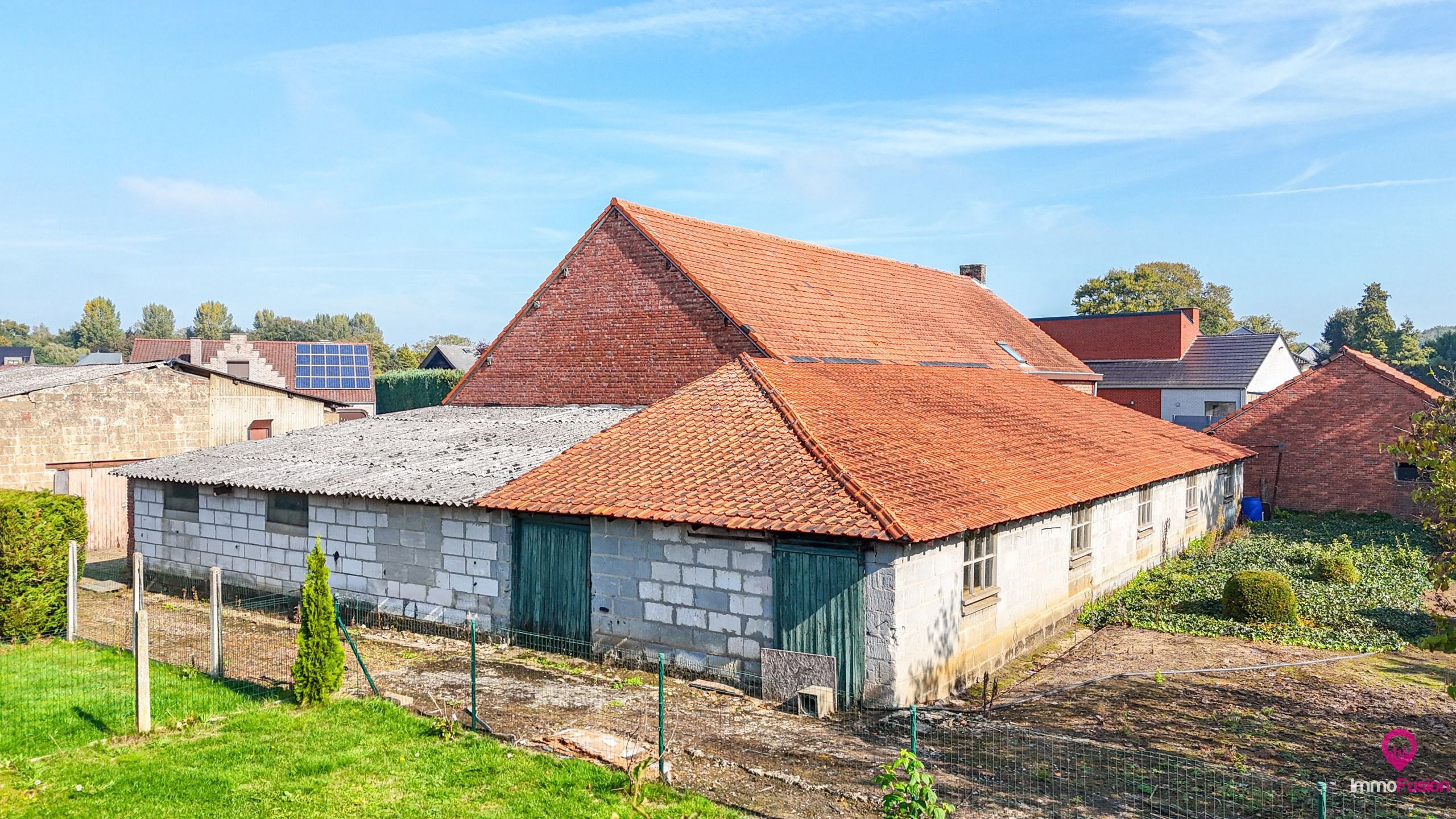 Ruime boerderij op ±33a met stallen en renovatiepotentieel! foto 26