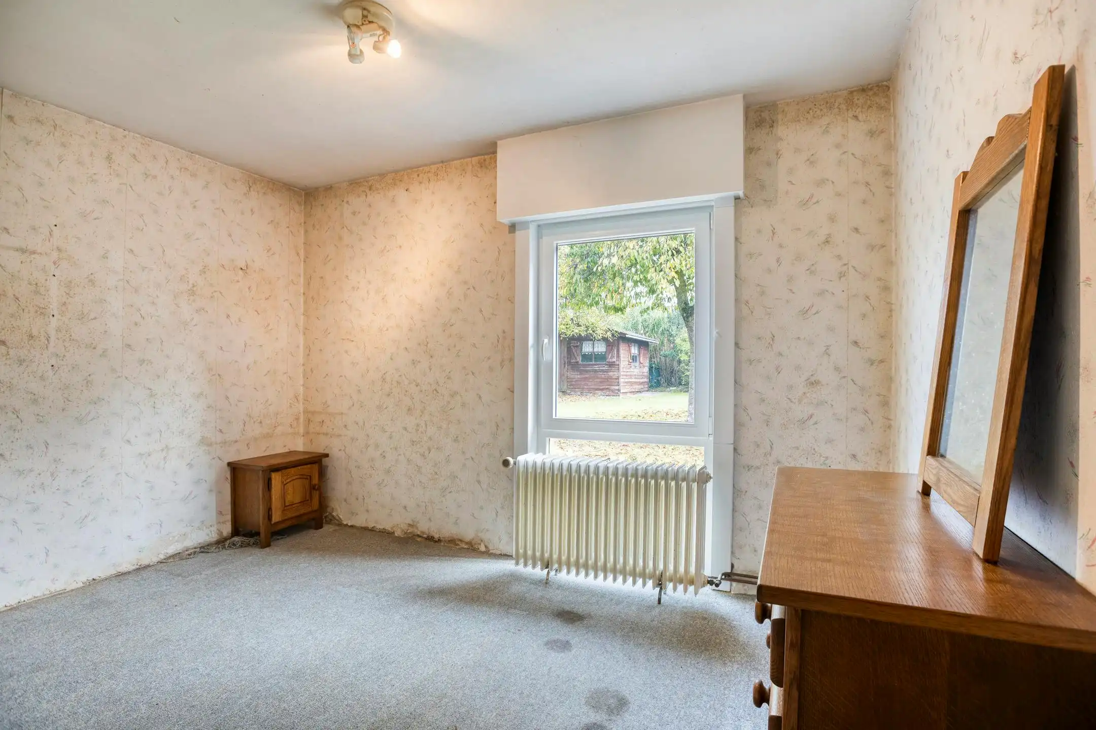 Gelijkvloers huis te koop met 3 slaapkamers, garage en tuin foto 17