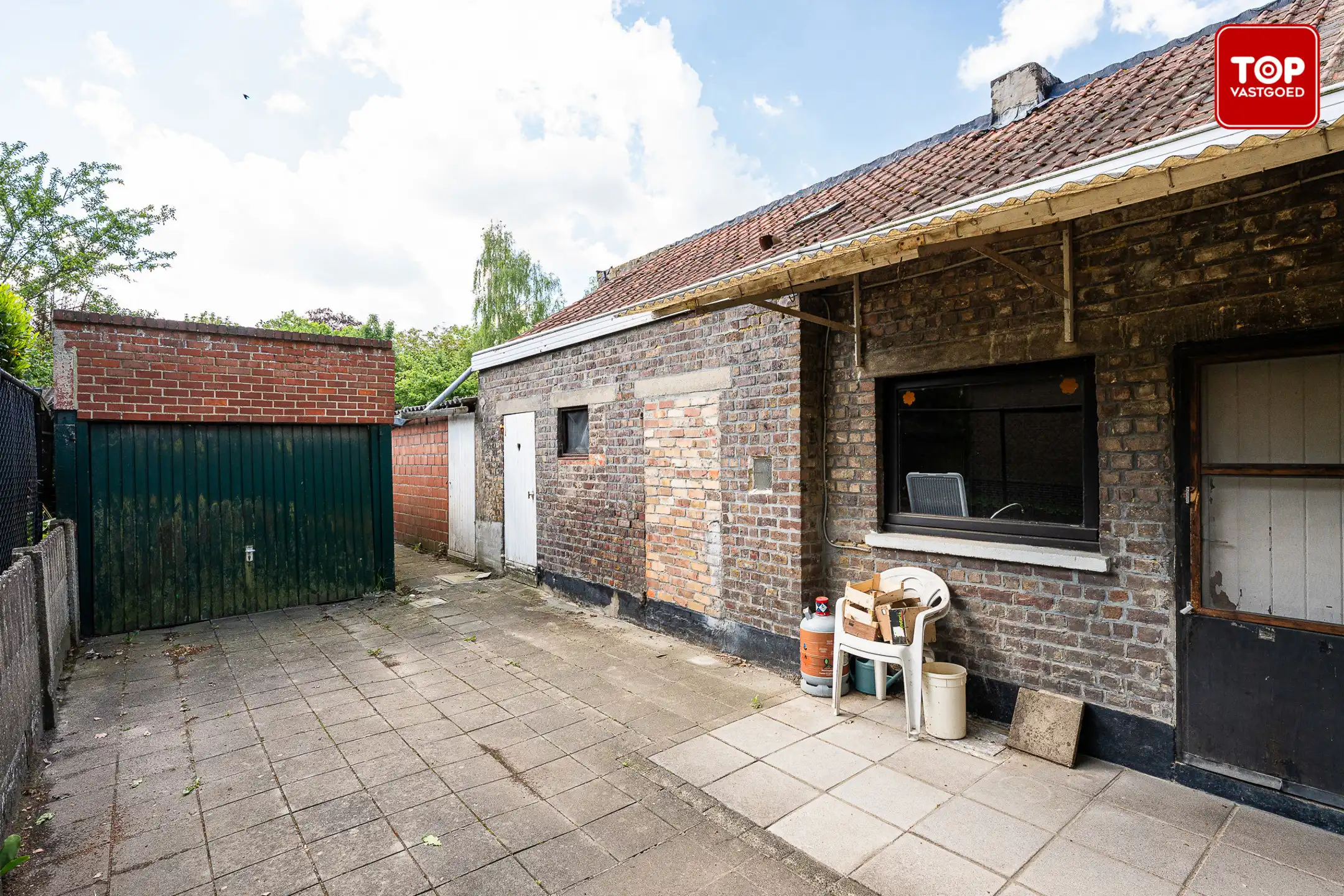 Te renoveren woning met zonnige tuin foto 14