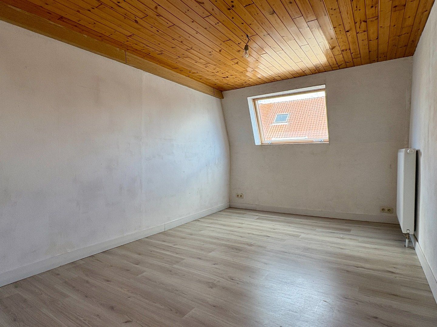 Centraal gelegen woning met goed georiënteerde tuin en 3 slaapkamers. foto 10