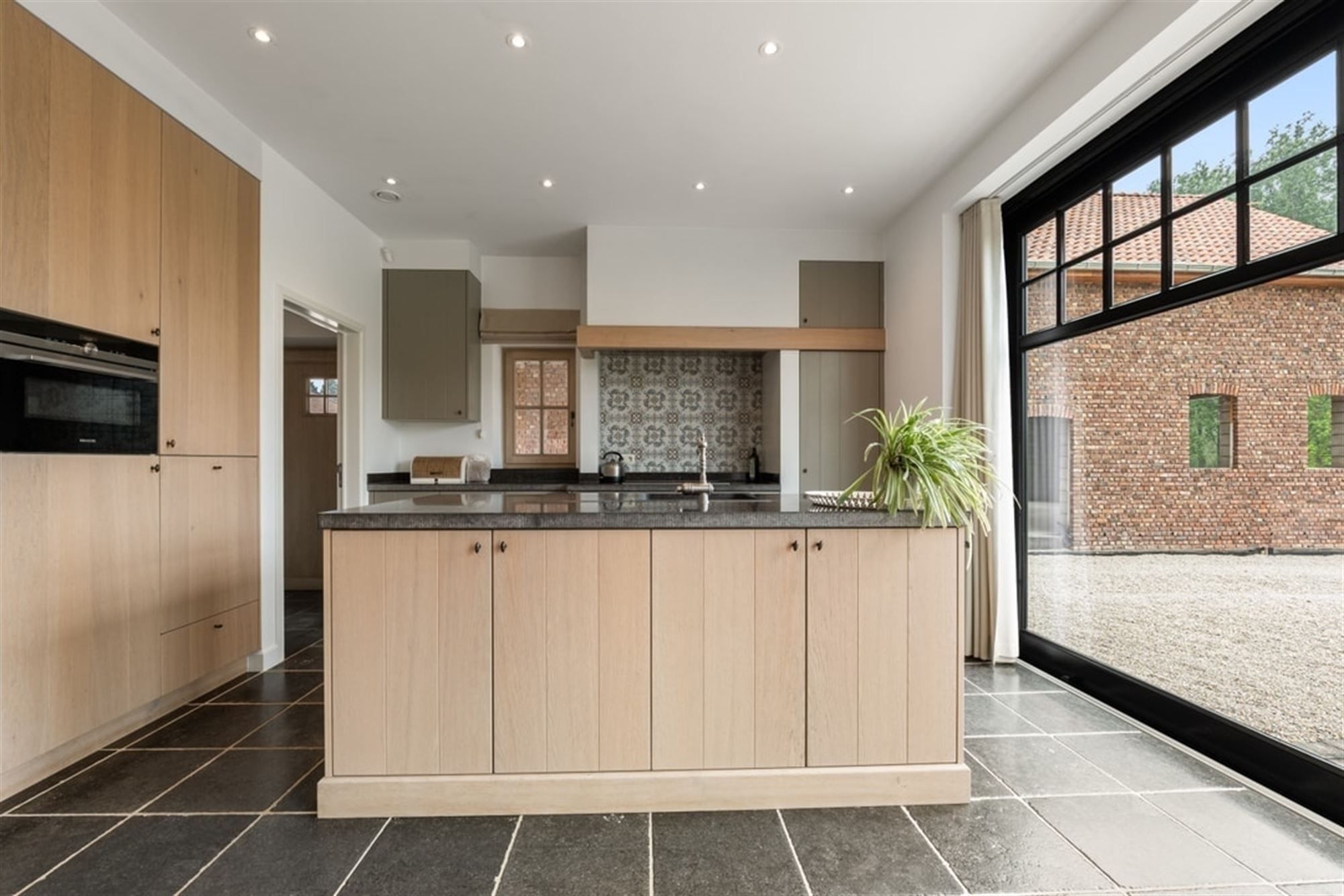 UNIEKE LANDELIJKE GEZINSWONING MET BIJBOUW VAN 320M² OP PRACHTIG PERCEEL  foto 10