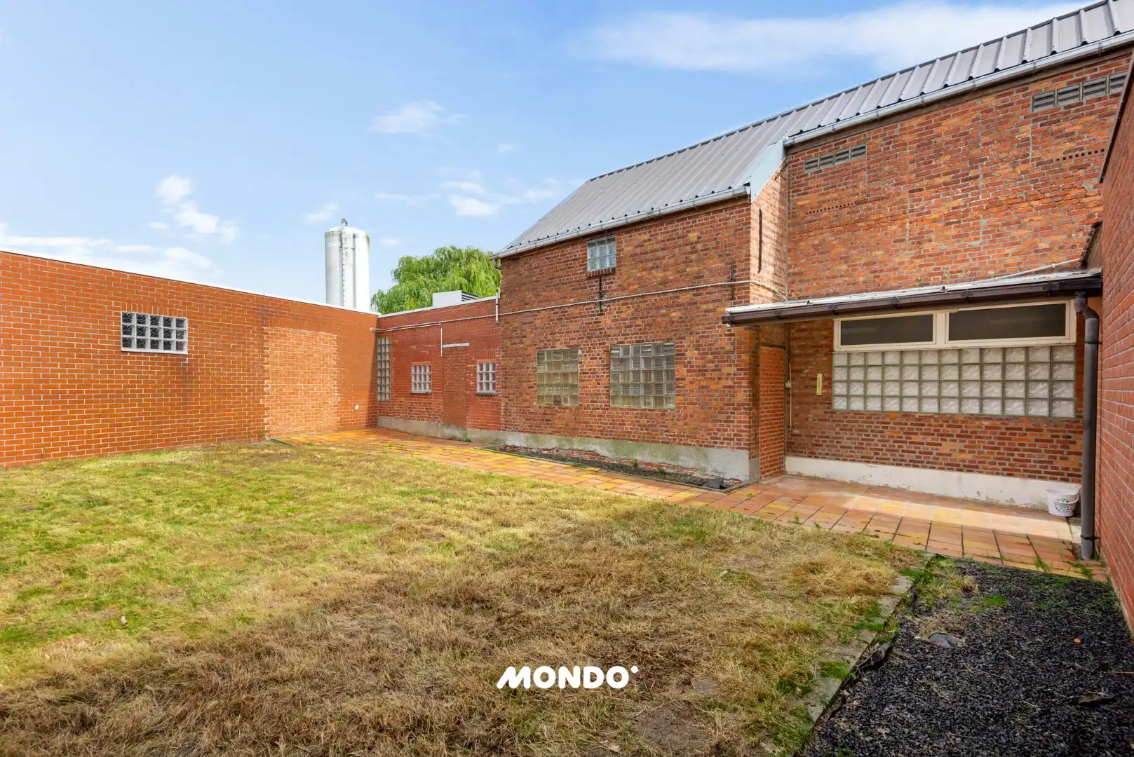 Veelzijdige rijwoning met tuin, binnenkoer en uitbouwmogelijkheden te Opwijk! foto 16