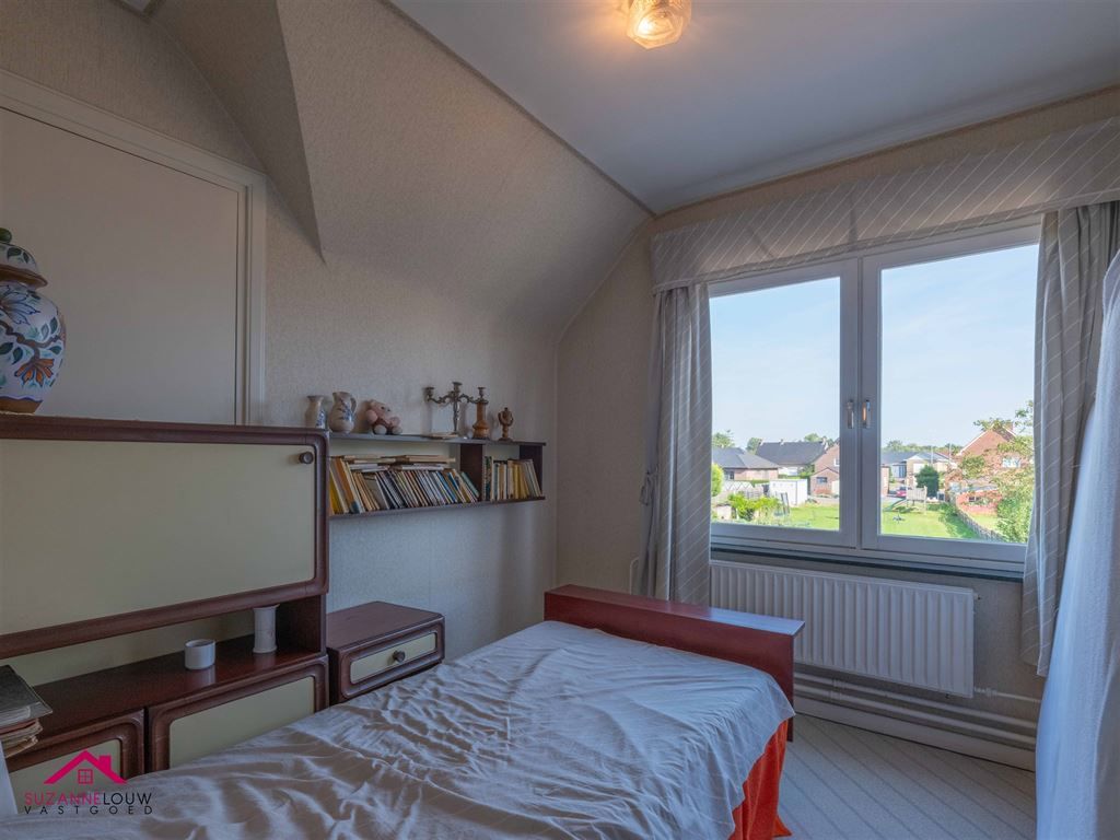 Te renoveren, vrijstaande woning op ruim perceel, genietend van een rustige ligging op een steenworp van het centrum foto 31